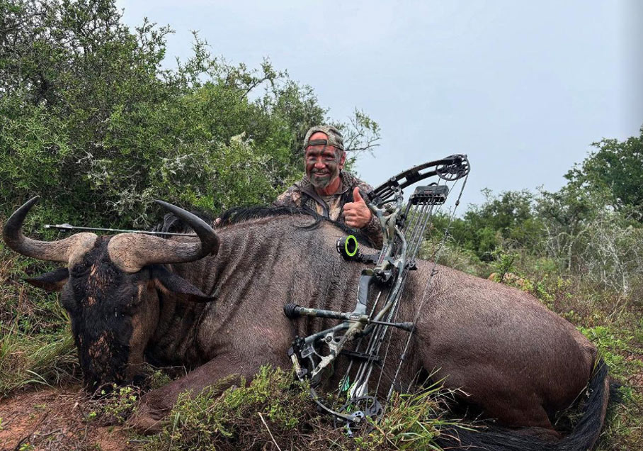 Bruce with blue wildebeest taken during bowhunting safari in South Africa